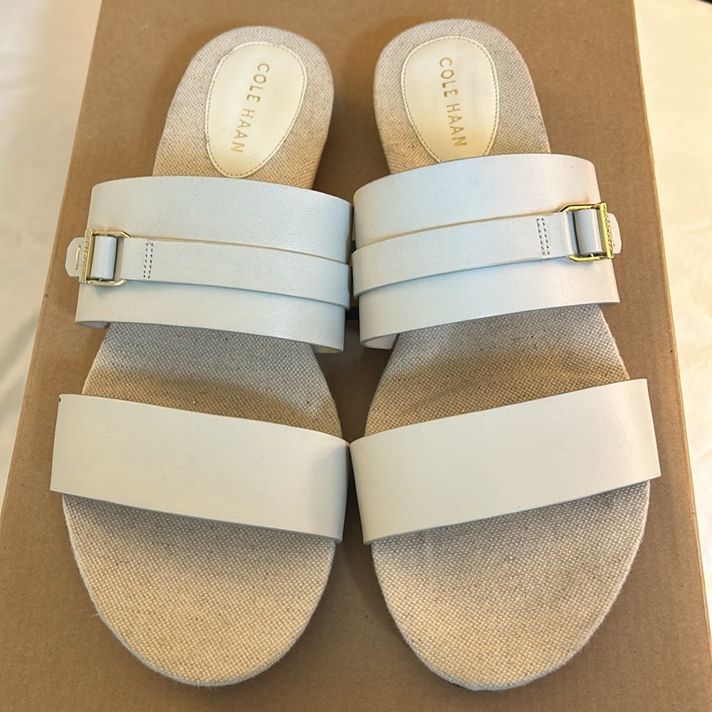 Cole Haan. Size 9B.  Ivory raffia canvas wedge sandal.  New without tags.